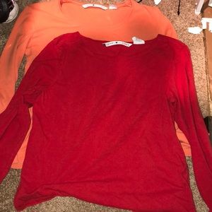 2 Tommy Hilfiger shirts, different colors